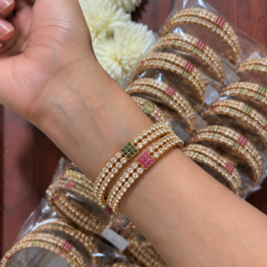 two layer gold stone bangles on wrist