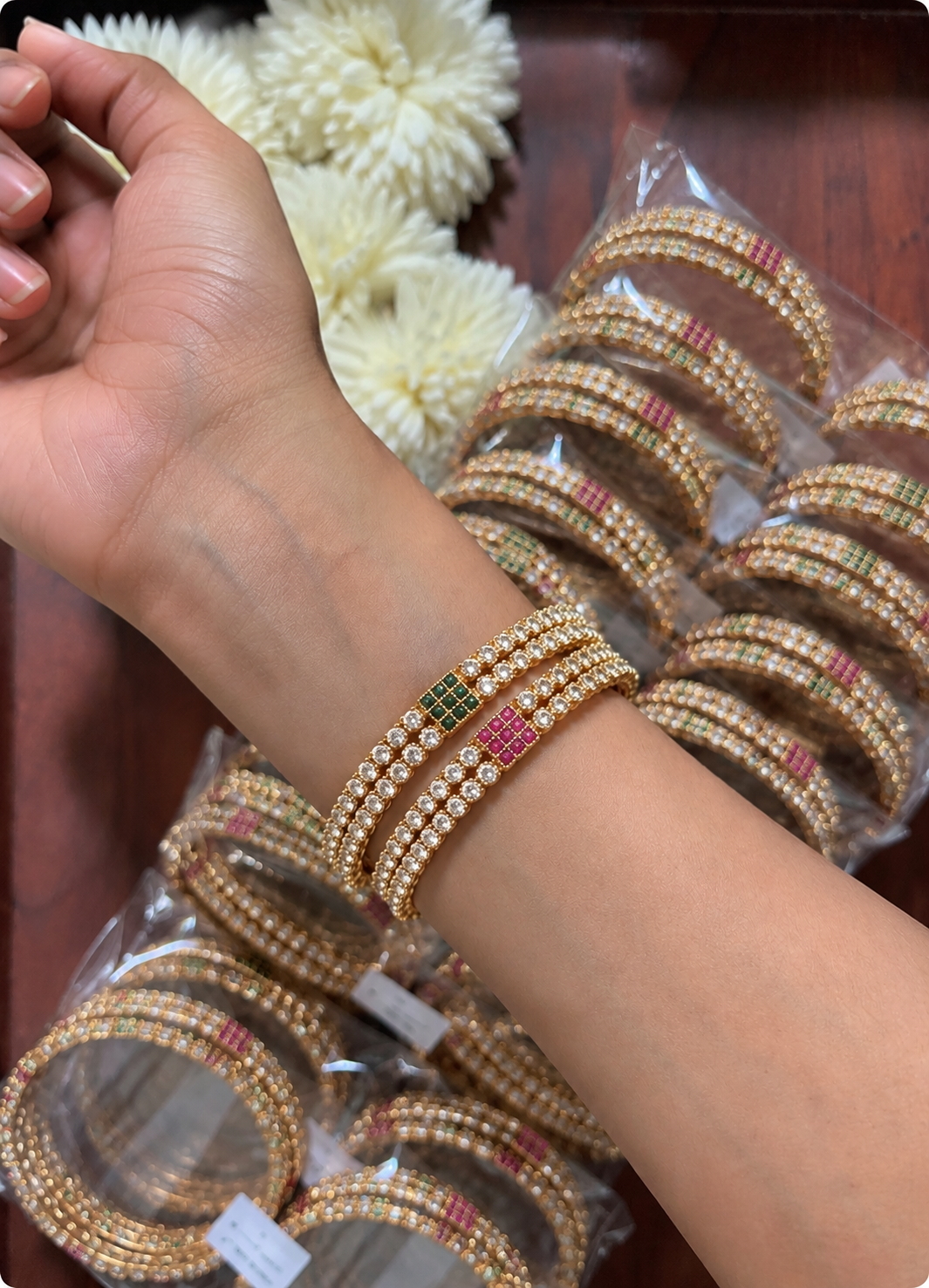 two layer gold stone bangles on wrist two layer gold stone bangles on wrist